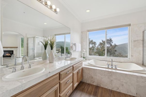 Bathroom, Dual Sink Vanities, Glass Shower, Interior, Recessed Lighting, Wood Texture Flooring