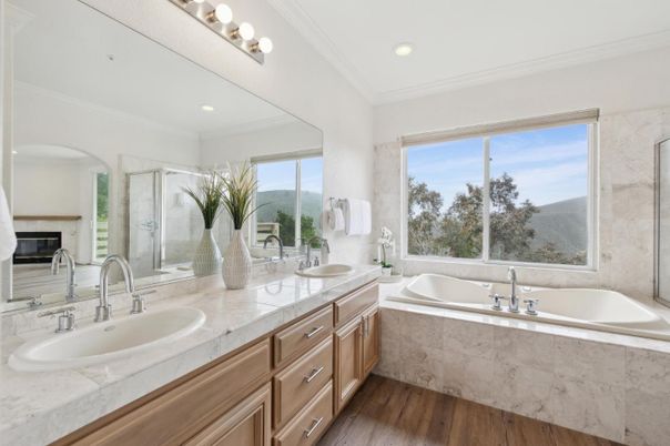 Bathroom, Dual Sink Vanities, Glass Shower, Interior, Recessed Lighting, Wood Texture Flooring