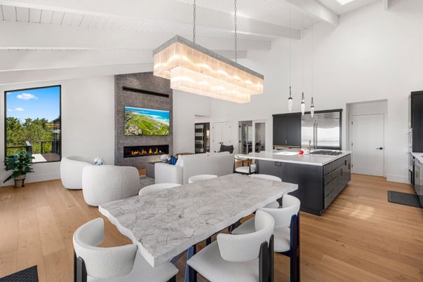 Dining room, Fireplace, Interior, Kitchen, Living room, Pendant Lights, Stainless Steel Appliances, Wood Texture Flooring