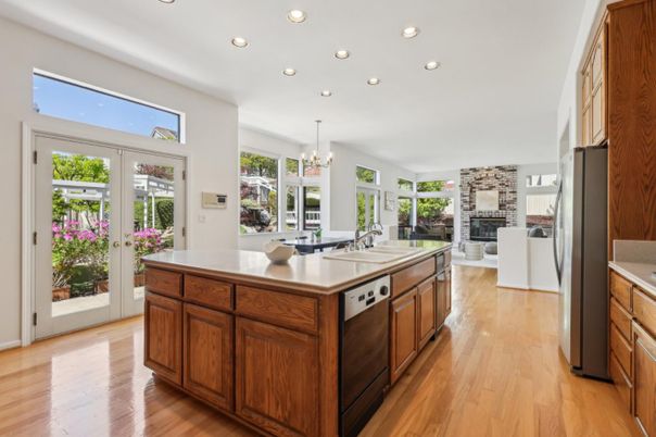 Chandelier, Dining room, Fireplace, Interior, Kitchen, Recessed Lighting, Wood Texture Flooring