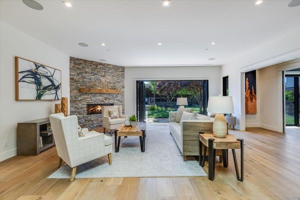 Fireplace, Interior, Living room, Recessed Lighting, Stone Walls, Wood Texture Flooring