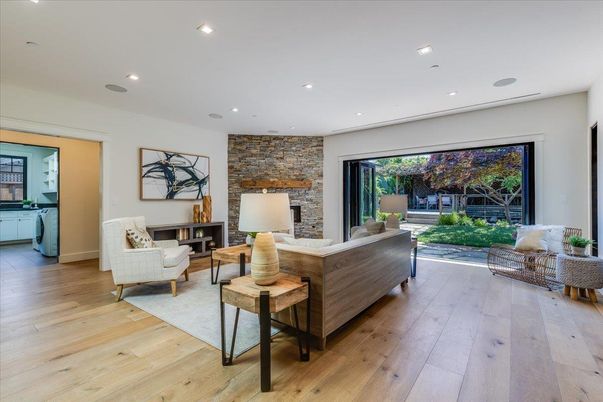 Fireplace, Interior, Living room, Recessed Lighting, Stone Walls, Wood Texture Flooring