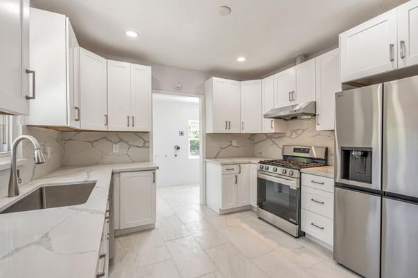 Interior, Kitchen, Marble, Marble Walls, Recessed Lighting, Stainless Steel Appliances
