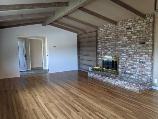 Empty room, Fireplace, Interior, Stone Walls, Wooden Beams, Wood Texture Flooring