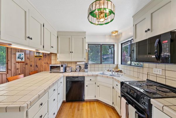 Interior, Kitchen, Tile Countertops, Wood Texture Flooring