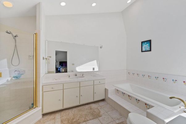 Bathroom, Dual Sink Vanities, Glass Shower, Interior, Recessed Lighting, Tile Countertops