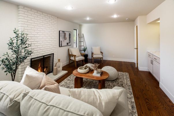Fireplace, Interior, Living room, Recessed Lighting, Stone Walls, Wood Texture Flooring