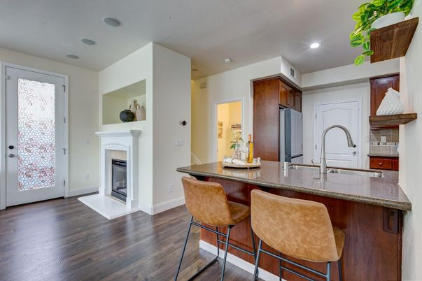 Fireplace, Interior, Kitchen, Recessed Lighting, Wood Texture Flooring