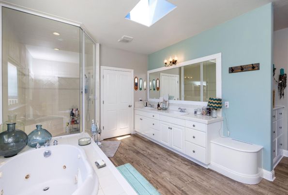 Bathroom, Dual Sink Vanities, Glass Shower, Interior, Recessed Lighting, Wood Texture Flooring