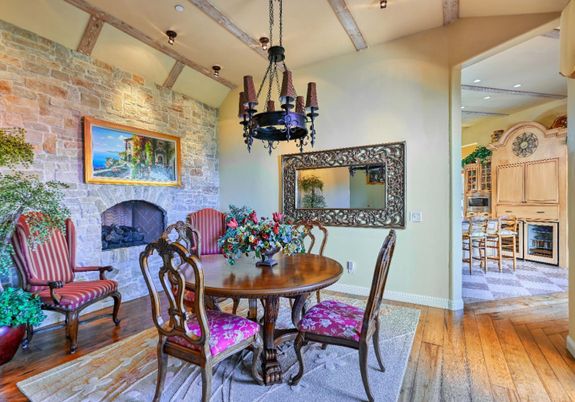 Dining room, Fireplace, Interior, Pendant Lights, Recessed Lighting, Stone Walls, Wooden Beams, Wood Texture Flooring