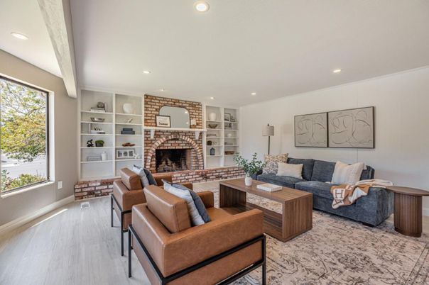 Fireplace, Interior, Living room, Recessed Lighting, Stone Walls, Wood Texture Flooring