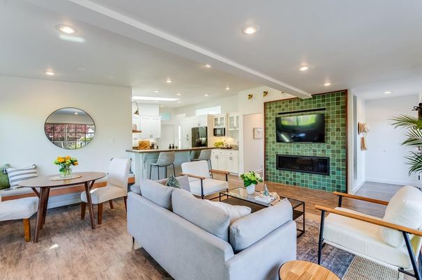 Dining room, Fireplace, Interior, Kitchen, Living room, Recessed Lighting, Stone Walls, Wood Texture Flooring