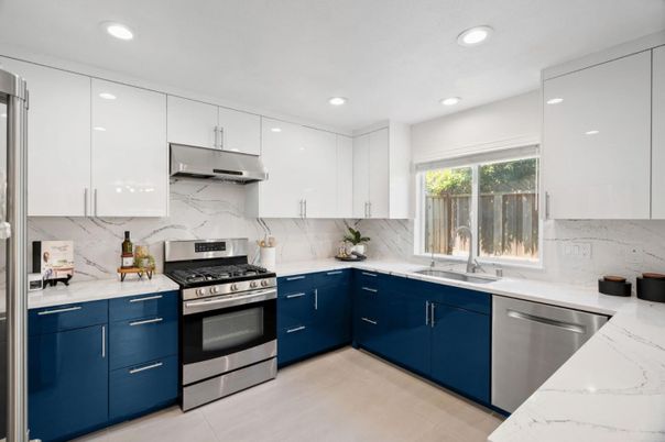 Interior, Kitchen, Marble Walls, Recessed Lighting, Stainless Steel Appliances