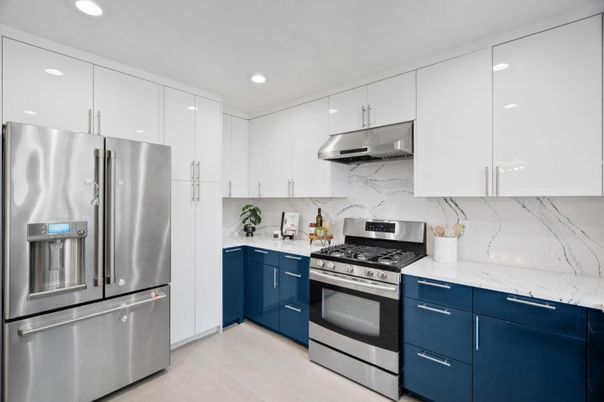 Interior, Kitchen, Marble Walls, Recessed Lighting, Stainless Steel Appliances