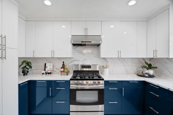 Interior, Kitchen, Marble Walls, Recessed Lighting, Stainless Steel Appliances