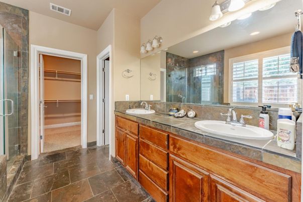 Bathroom, Dual Sink Vanities, Glass Shower, Interior, Recessed Lighting, Tile Countertops, Walk-in Closets