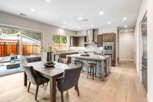 Dining room, Interior, Kitchen, Recessed Lighting, Stainless Steel Appliances, Wood Texture Flooring