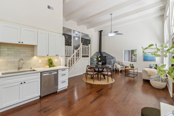 Dining room, Fireplace, Interior, Kitchen, Living room, Stainless Steel Appliances, Stone Walls, Wood Texture Flooring