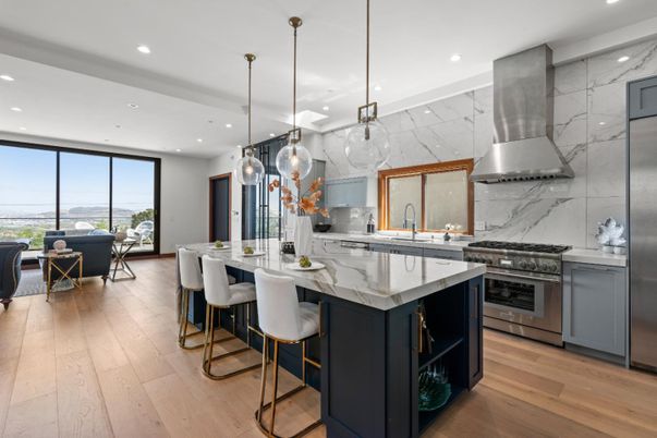 Dining room, Interior, Kitchen, Marble Walls, Pendant Lights, Recessed Lighting, Stainless Steel Appliances, Wood Texture Flooring