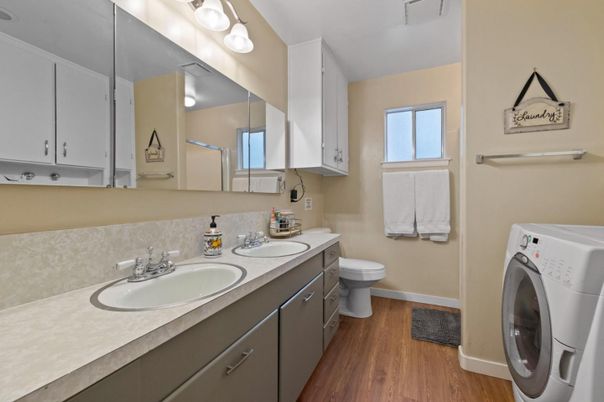 Bathroom, Dual Sink Vanities, Interior, Washer, Wood Texture Flooring