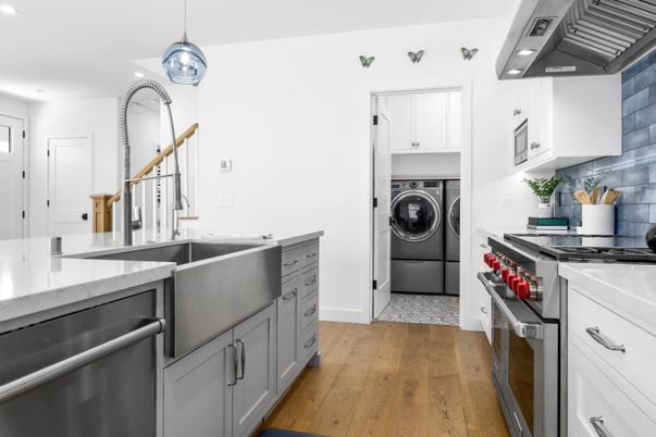Interior, Kitchen, Pendant Lights, Recessed Lighting, Stainless Steel Appliances, Washer, Wood Texture Flooring