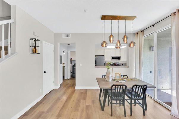 Dining room, Interior, Kitchen, Pendant Lights, Stainless Steel Appliances, Wood Texture Flooring