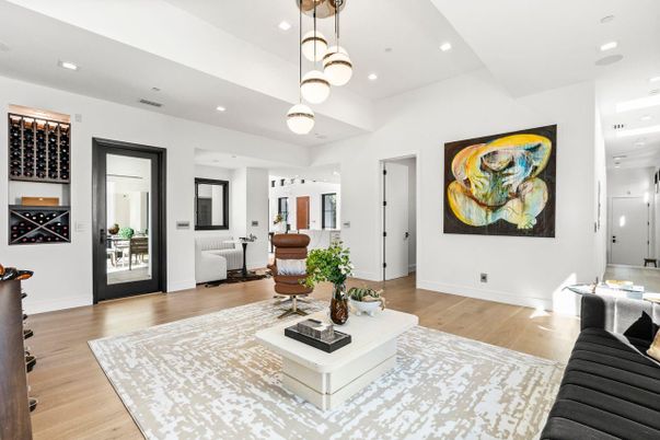 Interior, Living room, Pendant Lights, Recessed Lighting, Wine Storage, Wood Texture Flooring