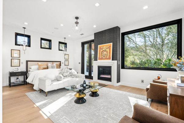 Bedroom, Fireplace, Interior, Pendant Lights, Recessed Lighting, Wood Texture Flooring