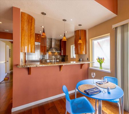 Dining room, Interior, Kitchen, Pendant Lights, Recessed Lighting, Stainless Steel Appliances, Wood Texture Flooring