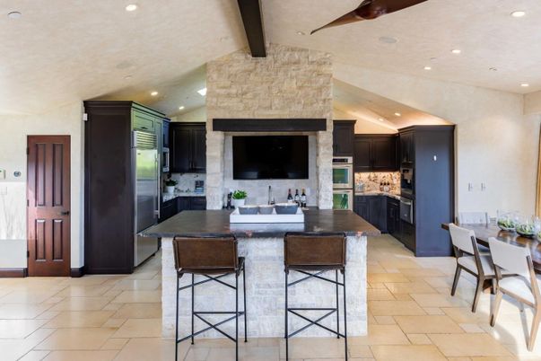 Dining room, Interior, Kitchen, Recessed Lighting, Stainless Steel Appliances, Stone Walls, Wooden Beams