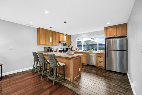 Interior, Kitchen, Pendant Lights, Recessed Lighting, Stainless Steel Appliances, Wood Texture Flooring