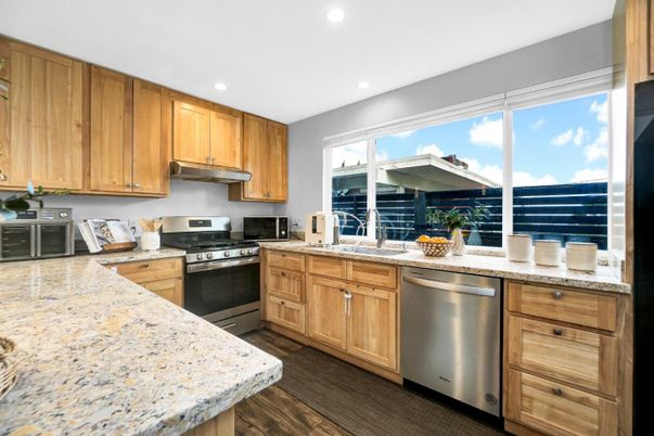 Interior, Kitchen, Recessed Lighting, Stainless Steel Appliances, Wood Texture Flooring