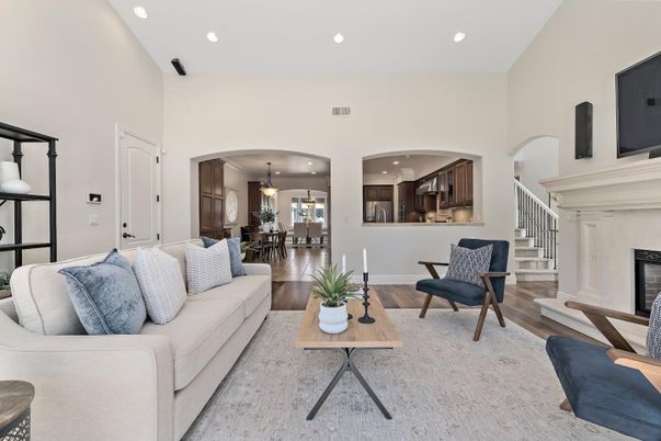 Dining room, Fireplace, Interior, Living room, Pendant Lights, Recessed Lighting, Wood Texture Flooring