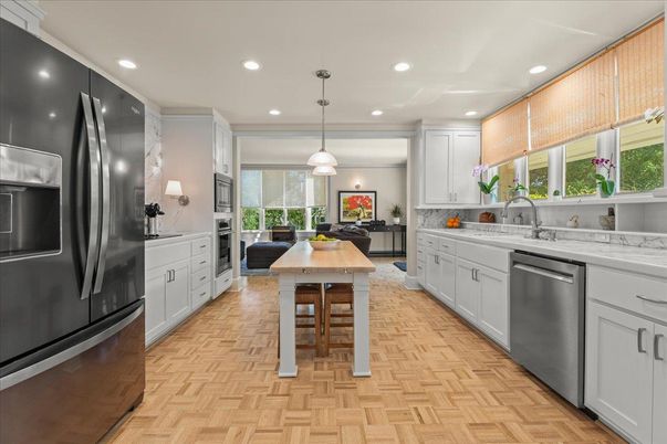 Dining room, Interior, Kitchen, Pendant Lights, Recessed Lighting, Stainless Steel Appliances, Wood Texture Flooring