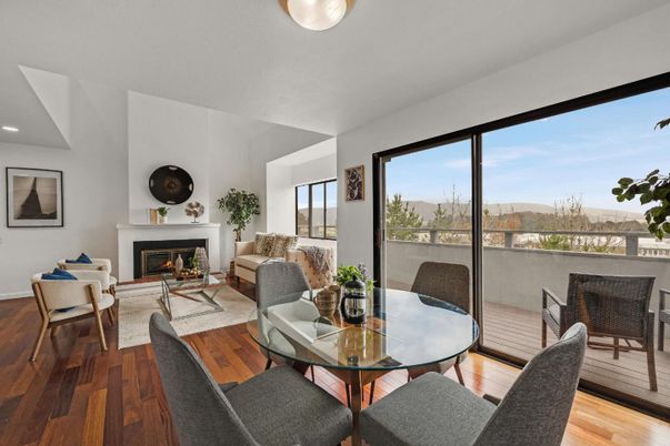 Dining room, Fireplace, Interior, Living room, Recessed Lighting, Wood Texture Flooring