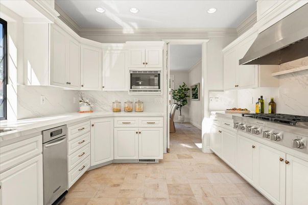 Interior, Kitchen, Marble Walls, Recessed Lighting, Stainless Steel Appliances