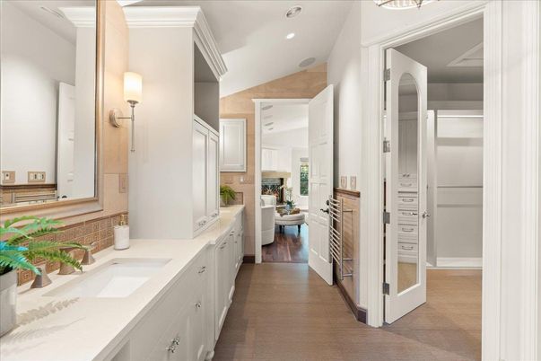 Bathroom, Dual Sink Vanities, Interior, Recessed Lighting, Wood Texture Flooring
