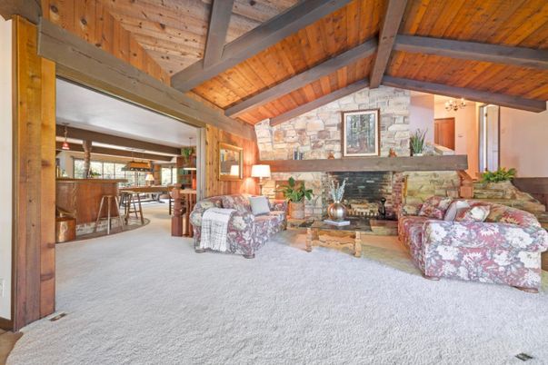 Chandelier, Dining room, Fireplace, Interior, Living room, Stone Walls, Wooden Beams, Wooden Ceilings
