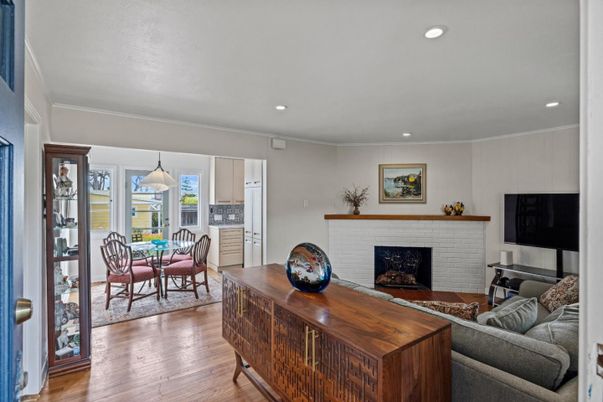 Dining room, Fireplace, Interior, Living room, Pendant Lights, Recessed Lighting, Wood Texture Flooring