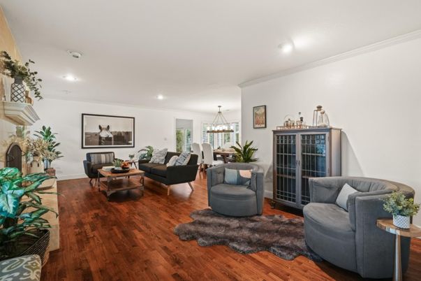 Chandelier, Dining room, Fireplace, Interior, Living room, Recessed Lighting, Wood Texture Flooring