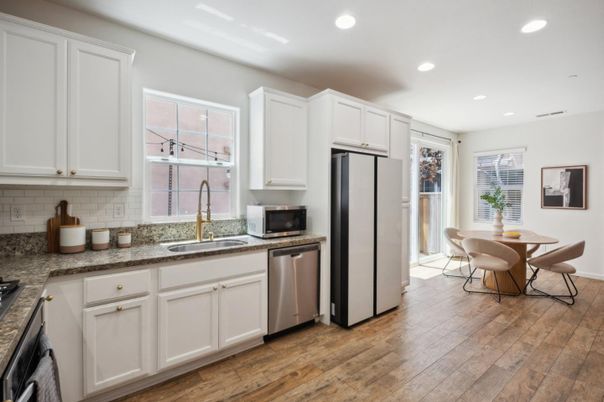 Dining room, Interior, Kitchen, Recessed Lighting, Stainless Steel Appliances, Wood Texture Flooring