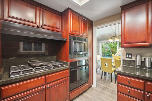 Dining room, Interior, Kitchen, Pendant Lights, Stainless Steel Appliances, Wood Texture Flooring