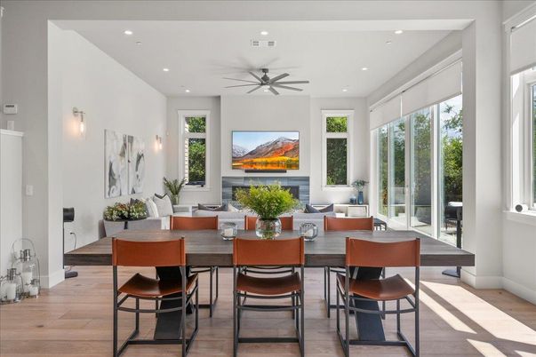 Dining room, Fireplace, Interior, Living room, Recessed Lighting, Wood Texture Flooring