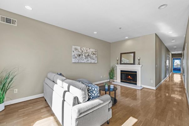 Fireplace, Interior, Living room, Recessed Lighting, Wood Texture Flooring