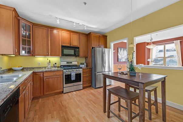 Dining room, Interior, Kitchen, Pendant Lights, Stainless Steel Appliances, Wood Texture Flooring