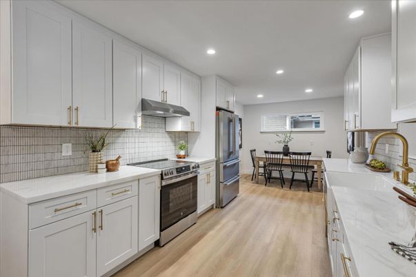 Dining room, Interior, Kitchen, Recessed Lighting, Stainless Steel Appliances, Wood Texture Flooring