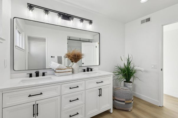 Bathroom, Dual Sink Vanities, Interior, Recessed Lighting, Wood Texture Flooring