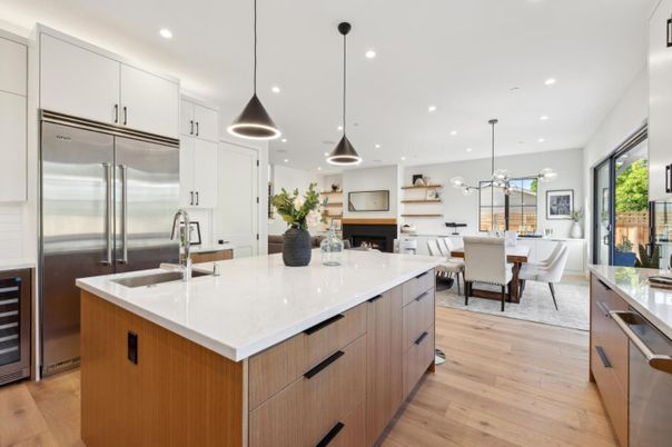 Dining room, Fireplace, Interior, Kitchen, Pendant Lights, Recessed Lighting, Stainless Steel Appliances, Wood Texture Flooring