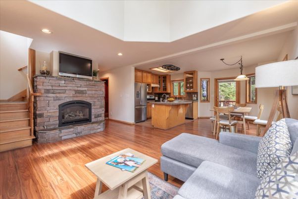 Dining room, Fireplace, Interior, Kitchen, Living room, Pendant Lights, Recessed Lighting, Stainless Steel Appliances, Wood Texture Flooring