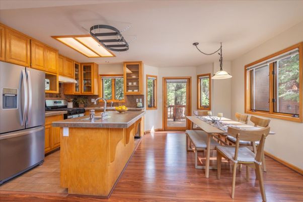 Dining room, Interior, Kitchen, Pendant Lights, Stainless Steel Appliances, Wood Texture Flooring